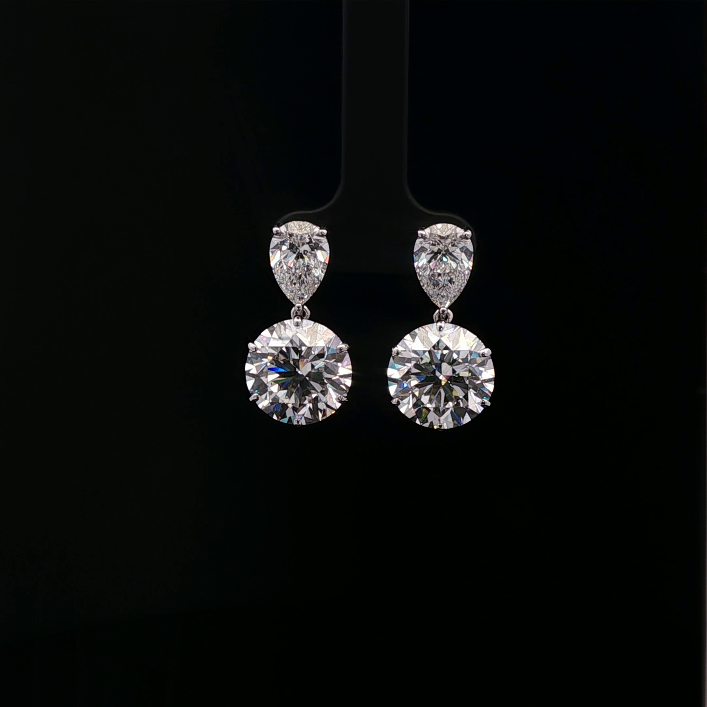 IGI 2.00ct D VVS2 Pear+8.08ct Round E VVS2 Earrings