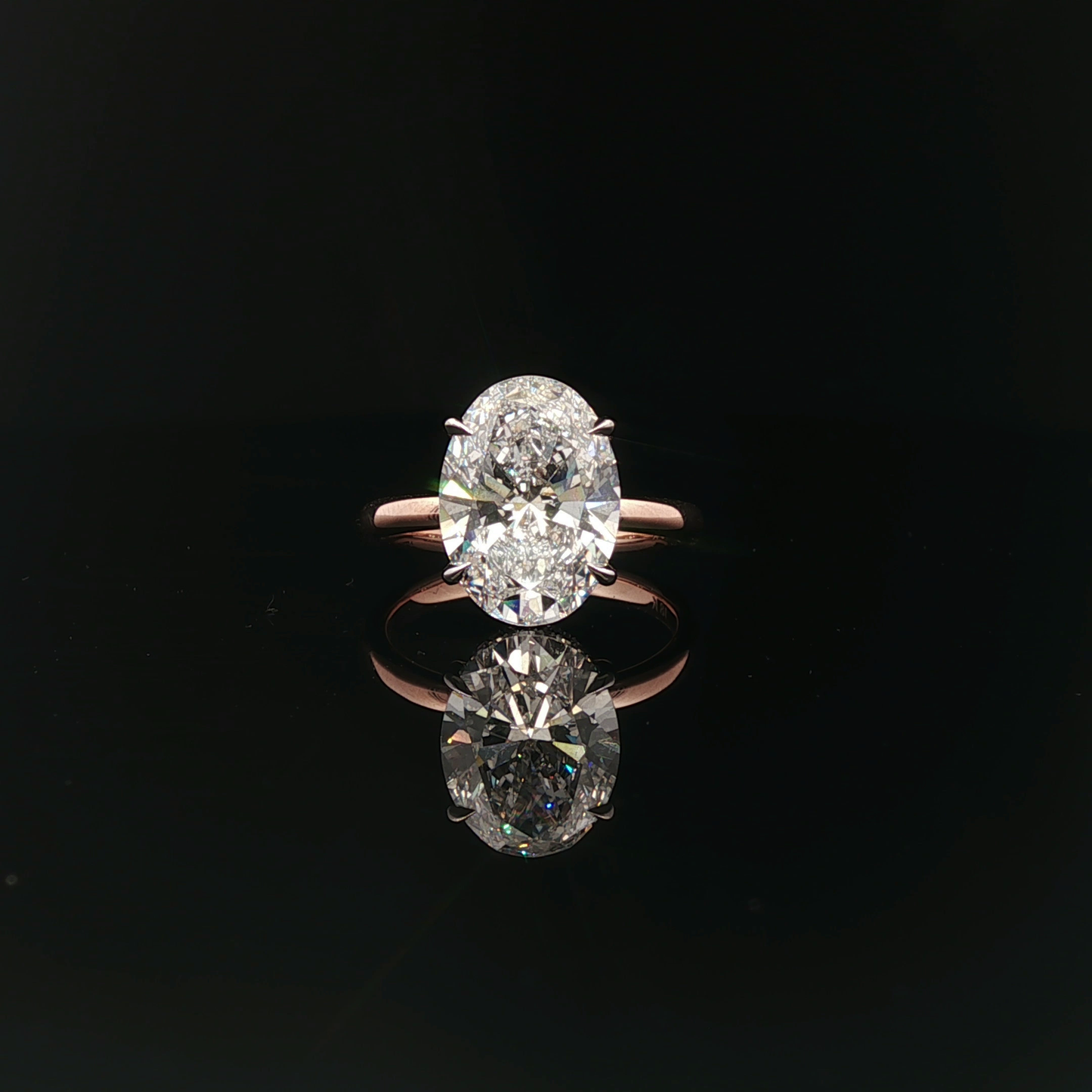 IGI Oval 5.01ct E VVS2 18k/W&R