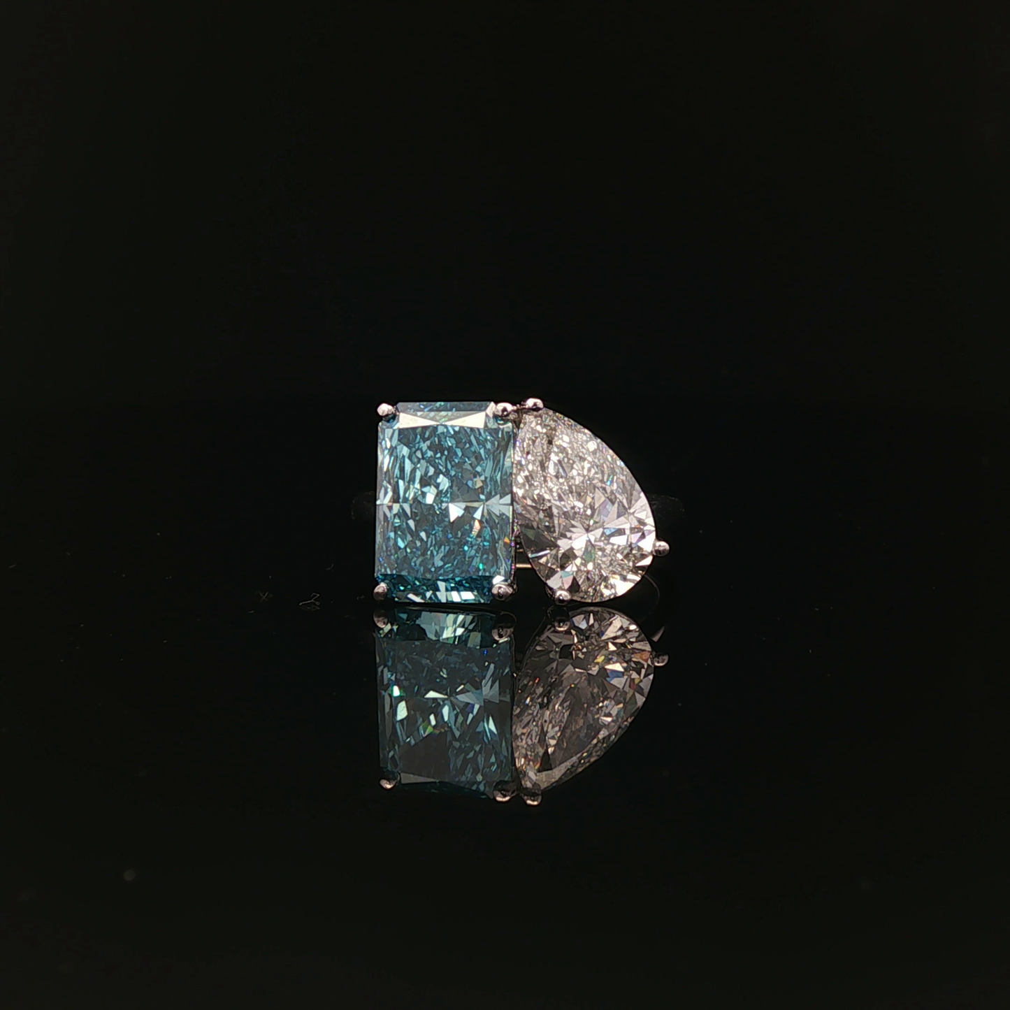 IGI Pear 2.56ct D VVS2 + Radiant 4.02ct Fancy Vivid Blue VS1  PT950