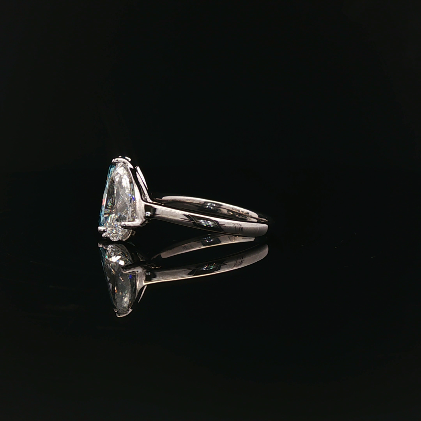 IGI Pear 2.56ct D VVS2 + Radiant 4.02ct Fancy Vivid Blue VS1  PT950