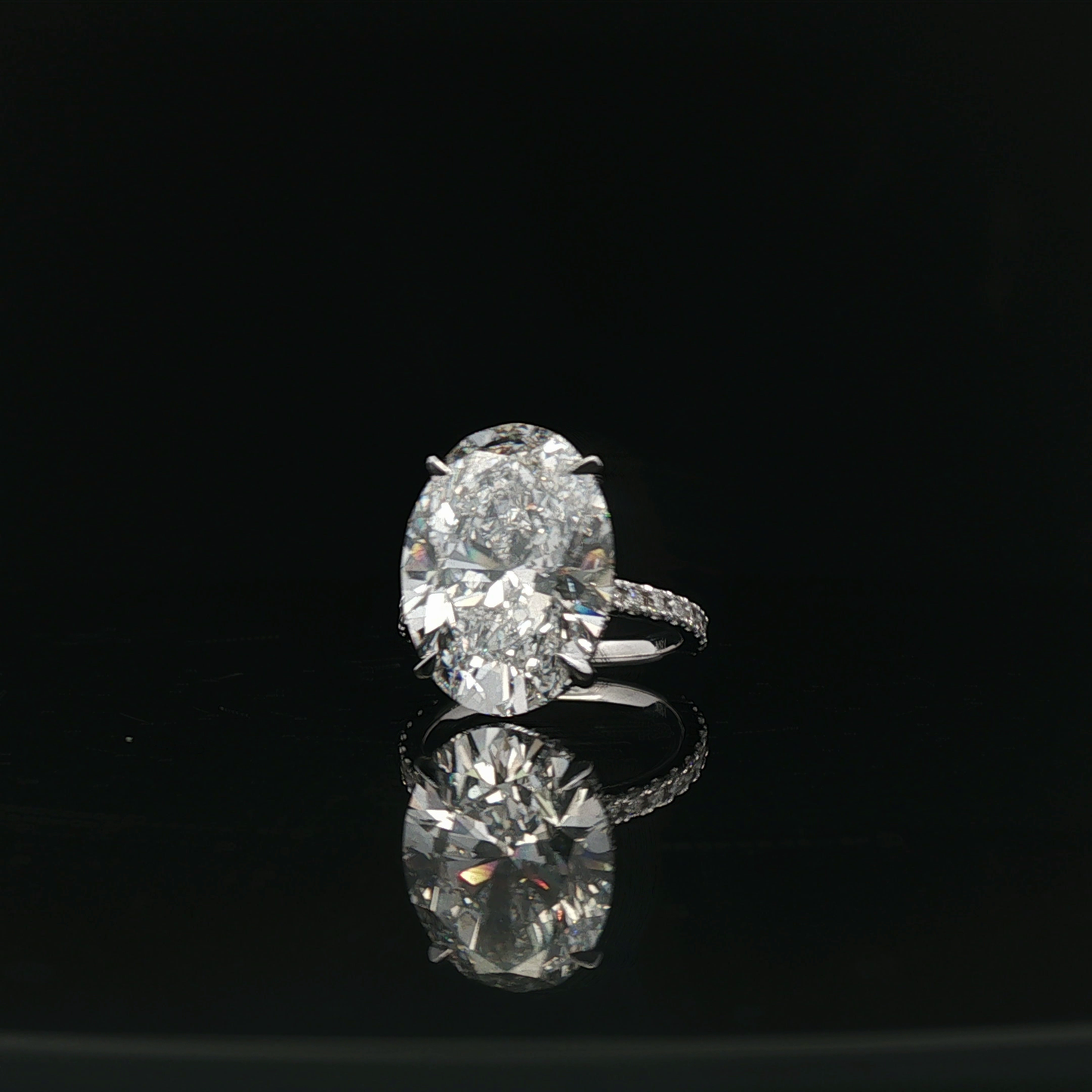 IGI Oval 11.57ct D VS1 18k/w