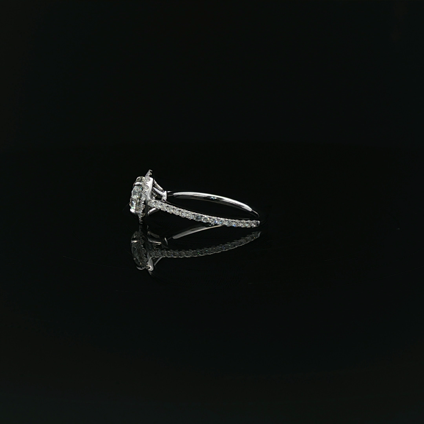 IGI 1.2ct Round halo ring 18kw
