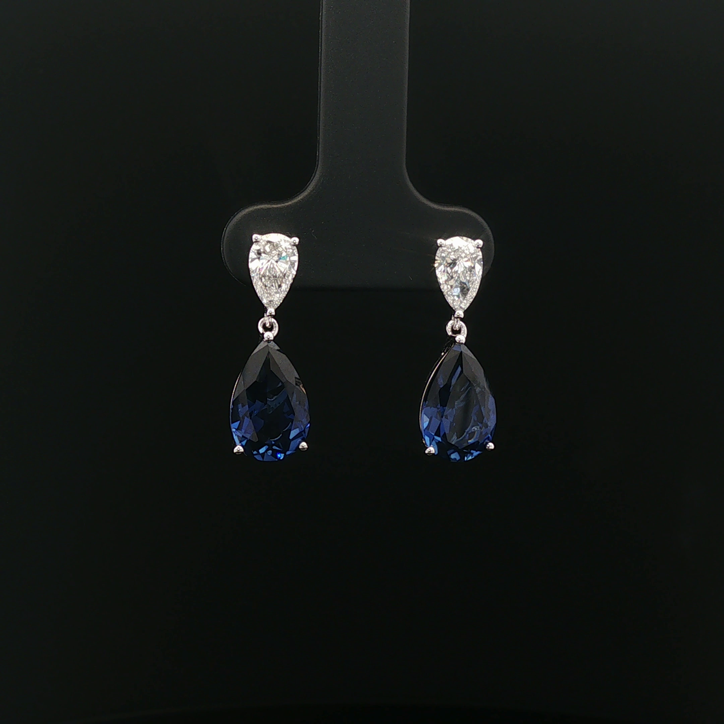 Royal Blue Sapphire Pear 5.48ct total with 0.4ct pear each 18k/w