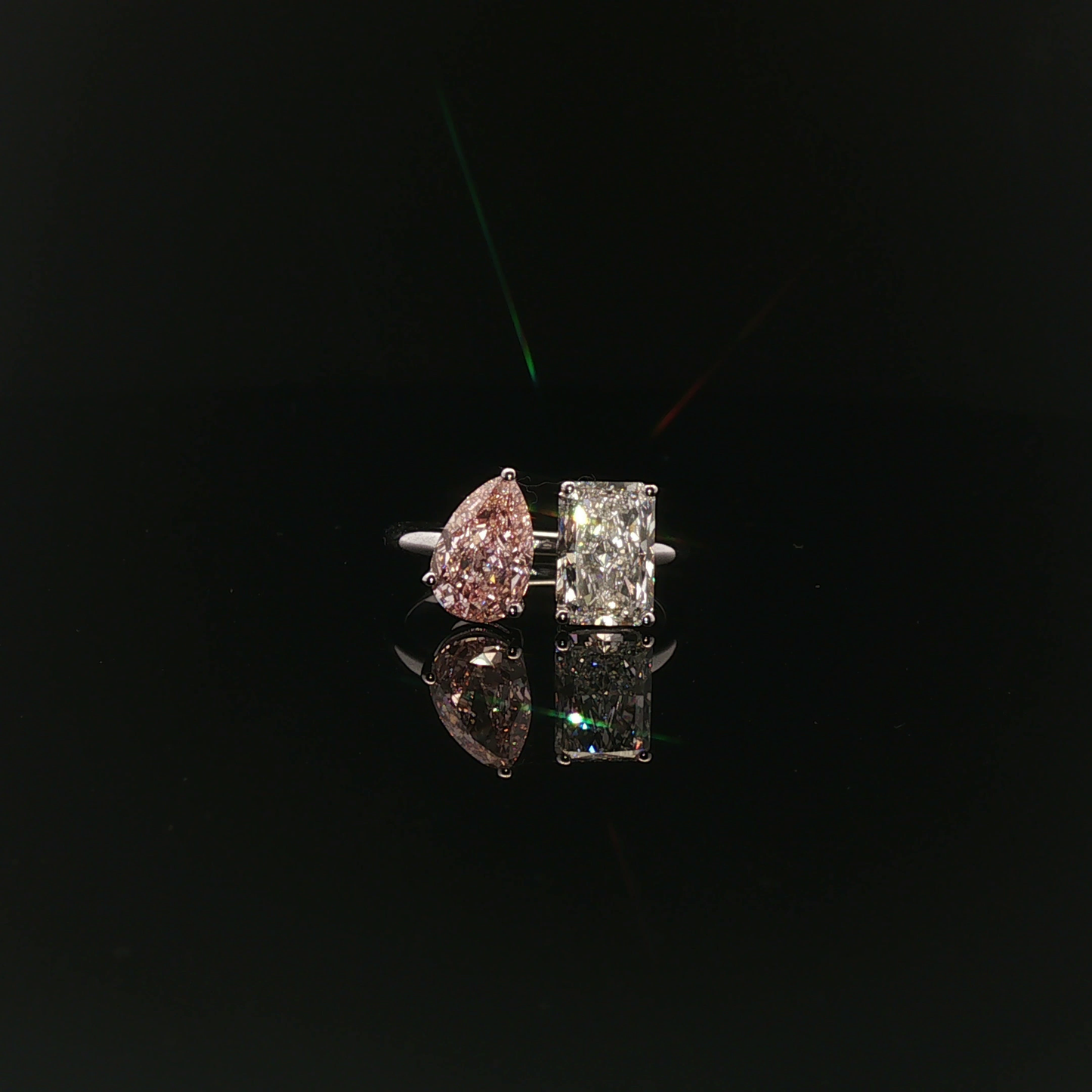 Toi et Moi Ring 
PEAR 1.57ct Fancy Intense Pink + Radiant 1.71ct D - 19,900$ HKD