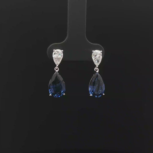 Royal Blue Sapphire Pear 5.48ct total with 0.4ct pear each 18k/w