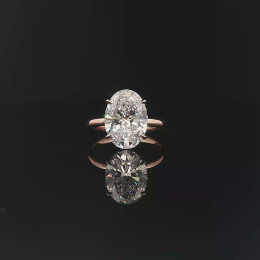IGI Oval 5.01ct E VVS2 18k/W&R