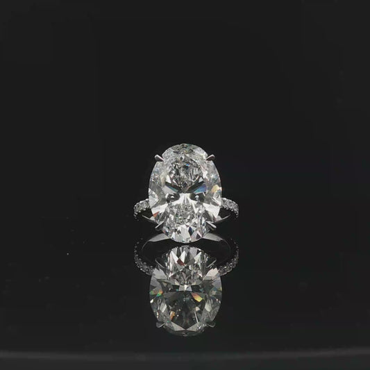 IGI Oval 11.57ct D VS1 18k/w